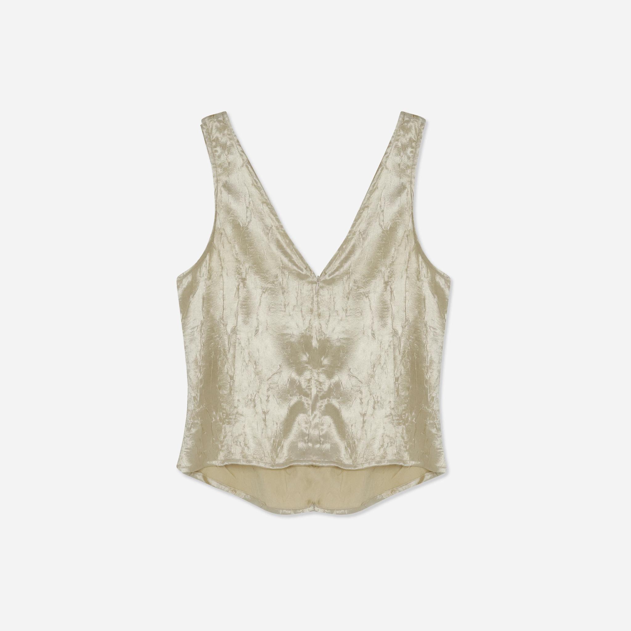 توب نسائي لامع product image